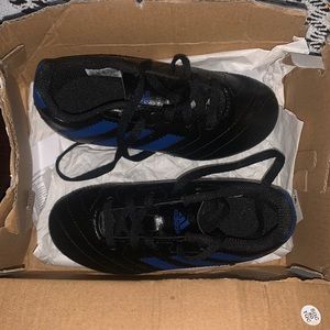 Soccer cleats and shin guards